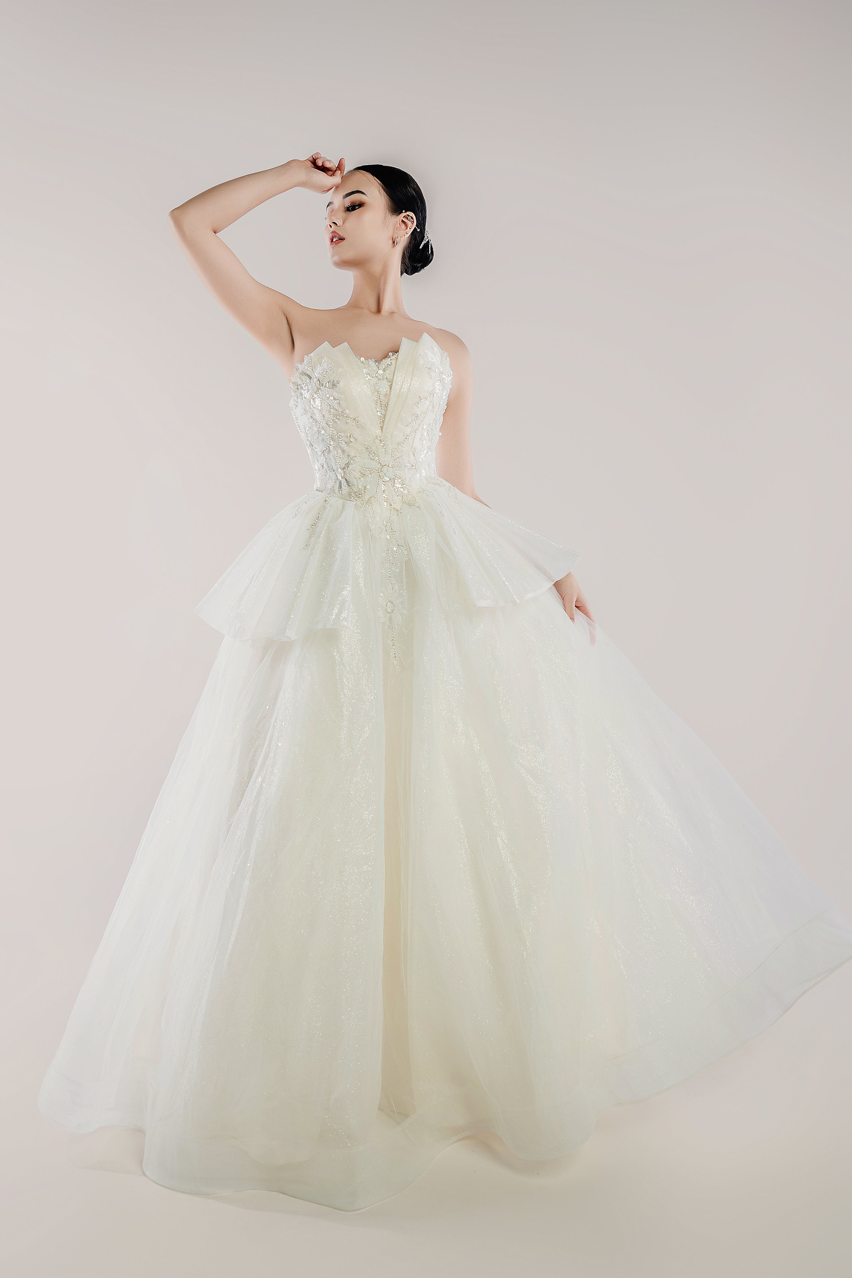 Strapless Sparkly Tulle Ball Gown Wedding Dress with Beaded Bodice and Layered Peplum – Stellara. WL Bridal & Gown