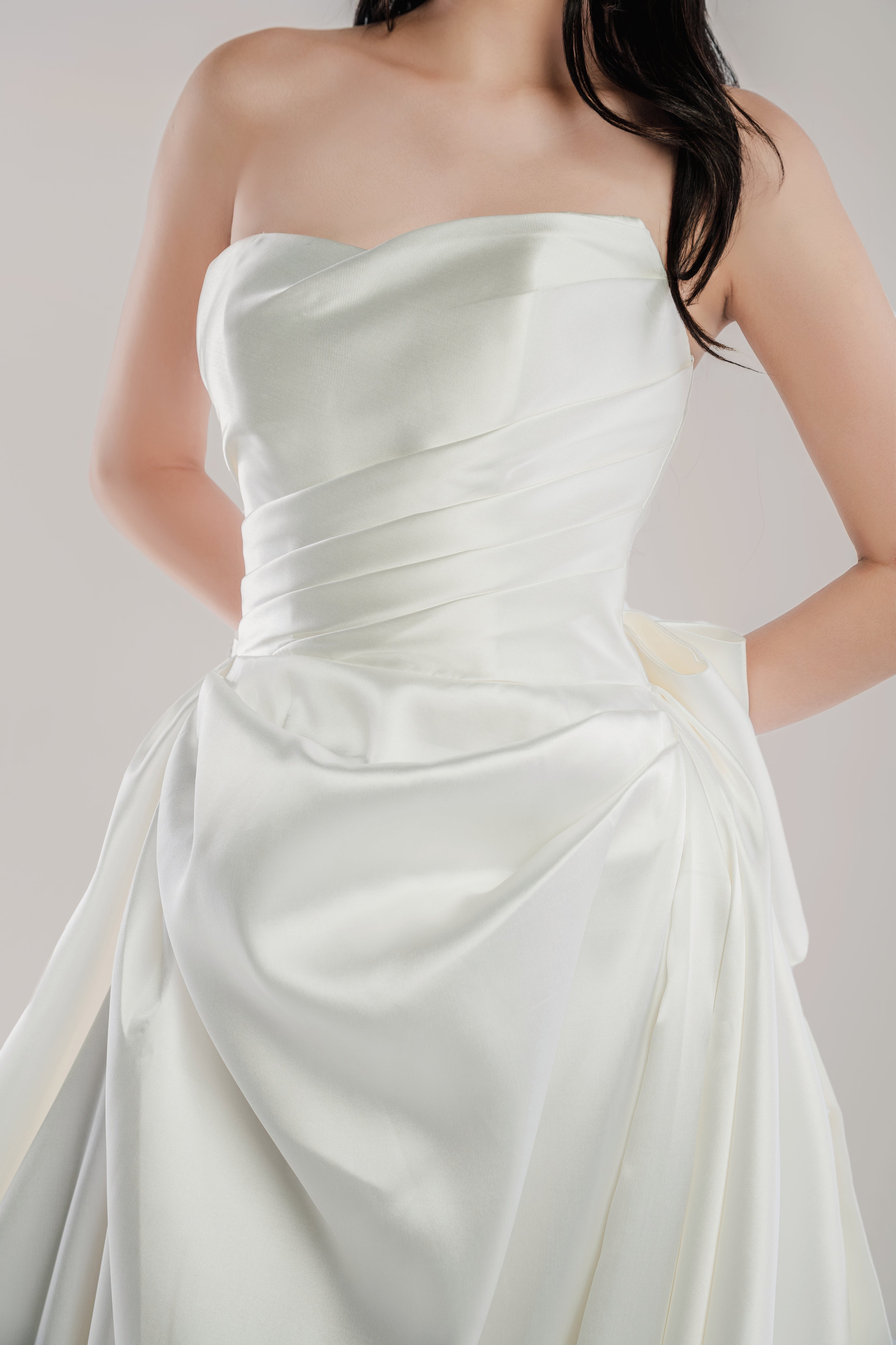 Strapless Satin A-Line Wedding Dress with Draped Bodice and Statement Bow Back - Seraphine. WL Bridal & Gown