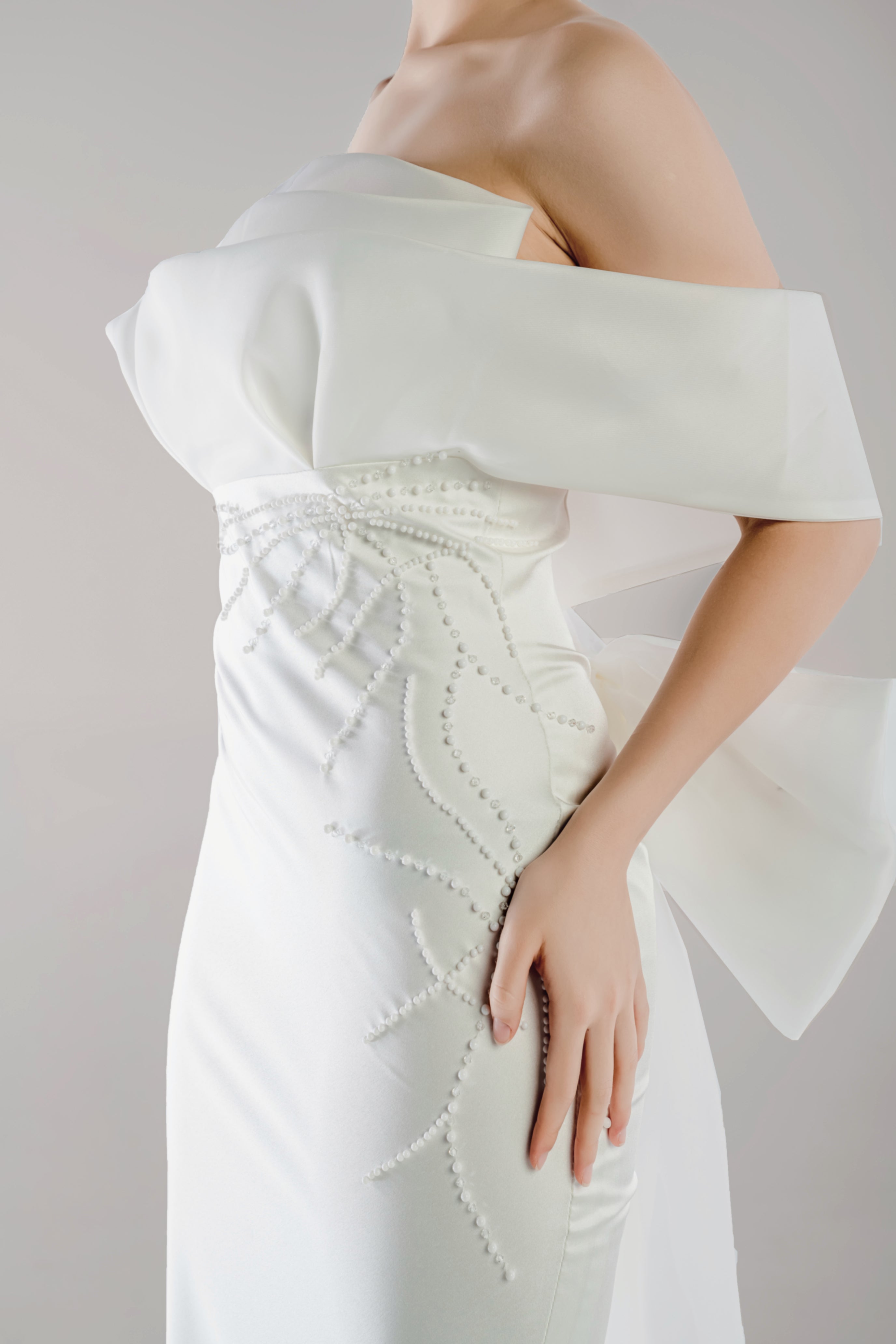 Arwyn · Modern Off-Shoulder Satin Wedding Gown with 3D Bow and Pearl Embellishment