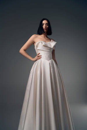Lunara one-shoulder origami satin A-line wedding dress, skirt view
