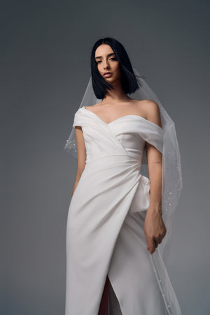 Reverie asymmetric draped wedding dress, side view