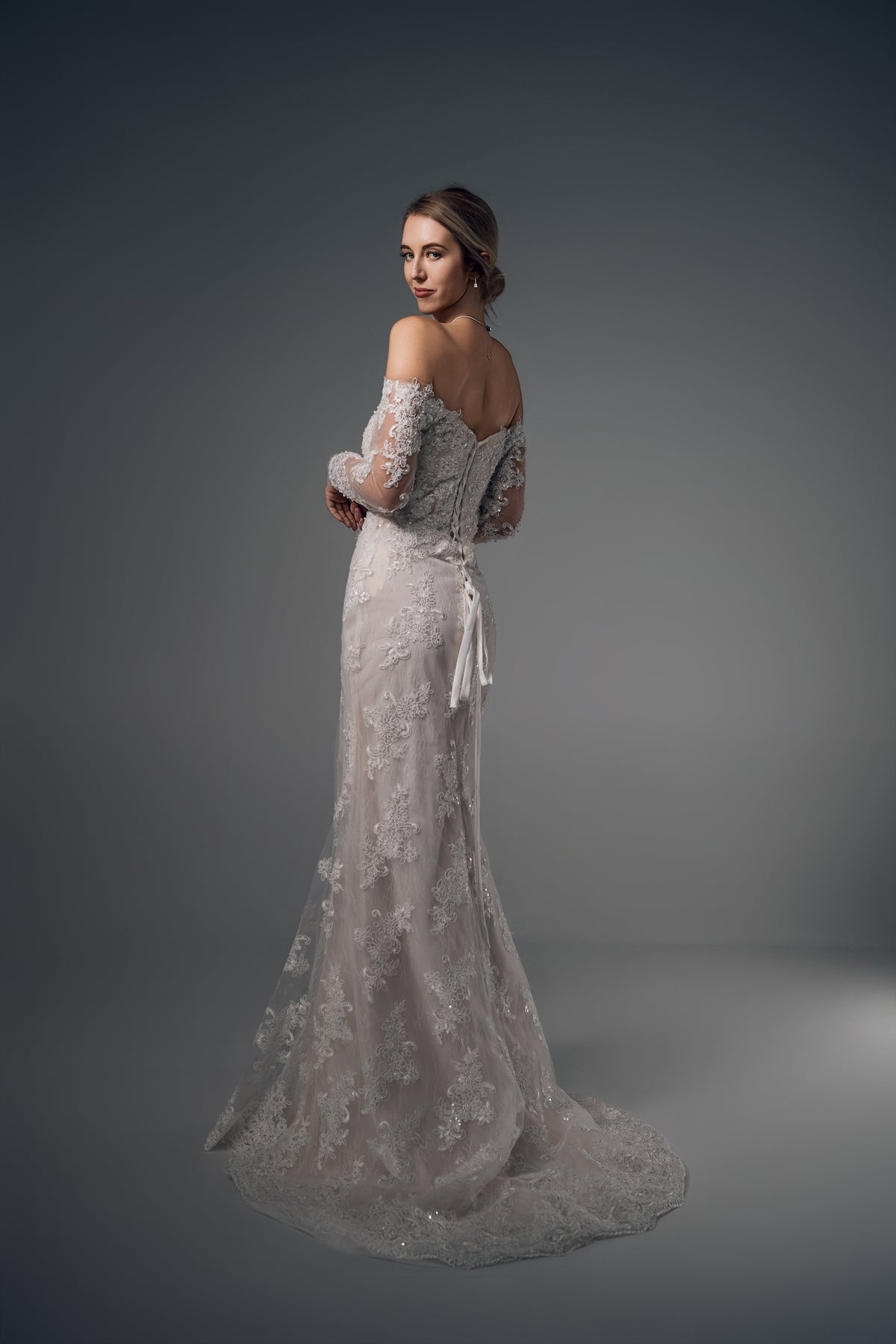 Amaris off-shoulder lace wedding dress, side view