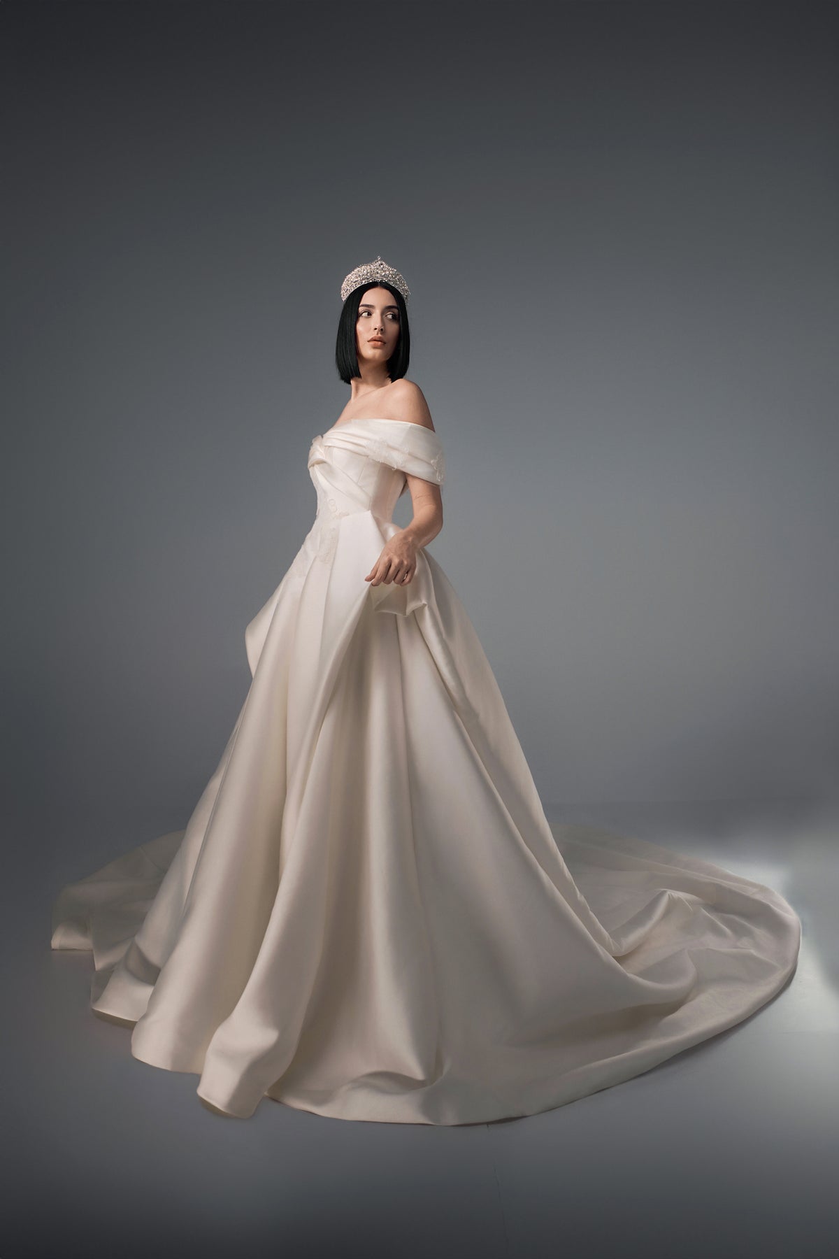 Callista off-shoulder satin A-line wedding dress, side train view