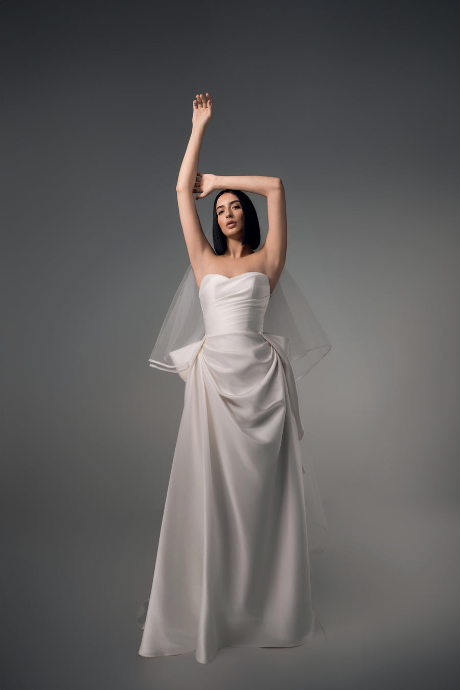 Cyrene minimal satin column wedding dress with sculptural bow back, front view