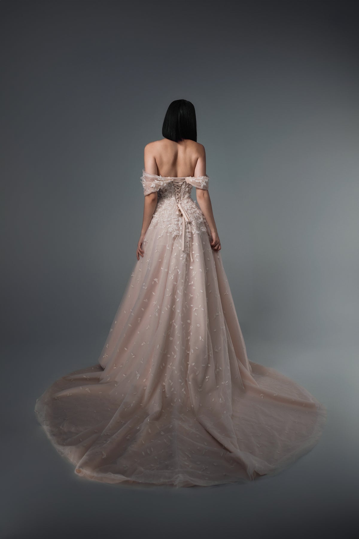 Delphine off-shoulder 3D floral tulle A-line wedding dress, back train view