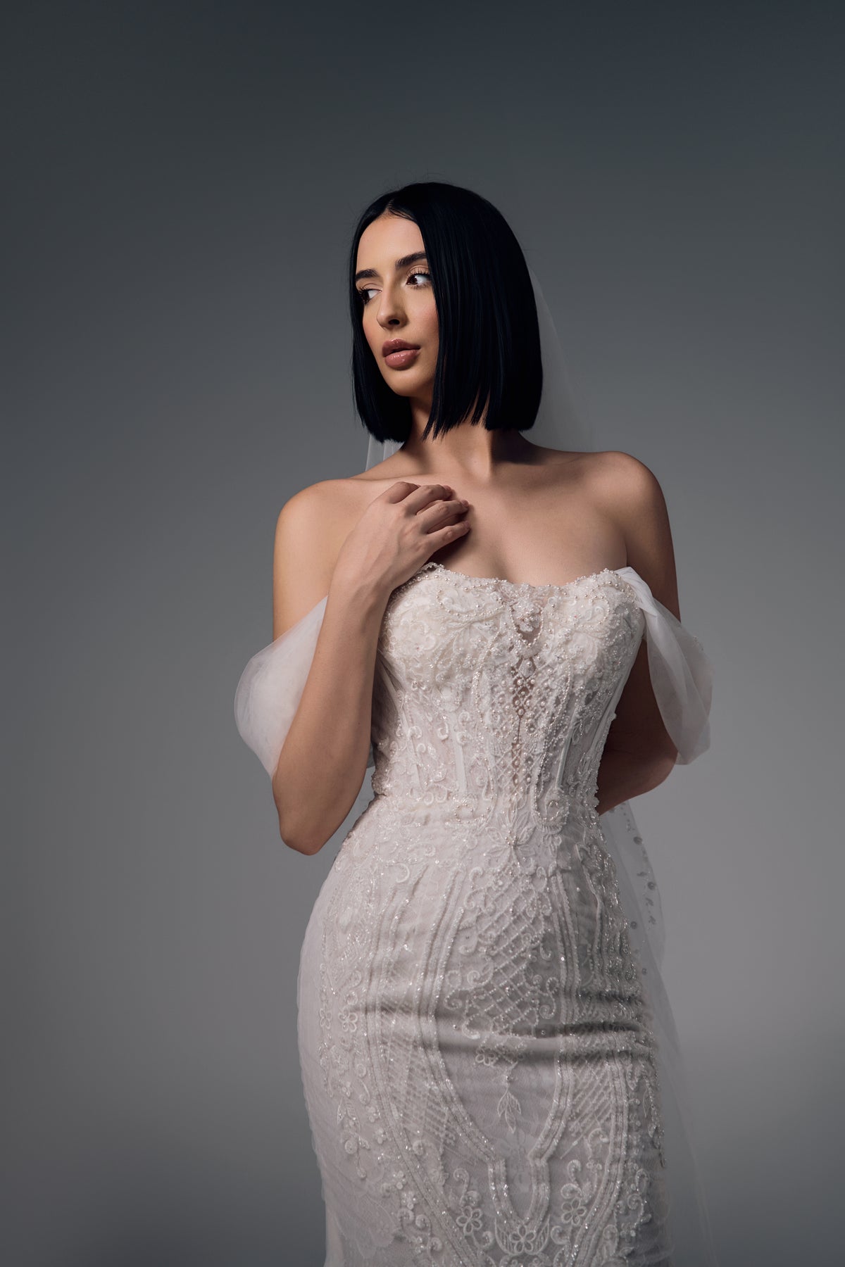 Eulalie off-shoulder lace bodice and draped sleeve detail