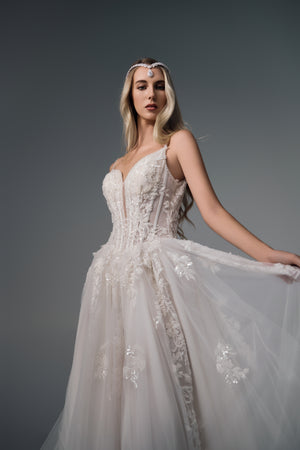 Evania spaghetti-strap lace A-line wedding dress, side view