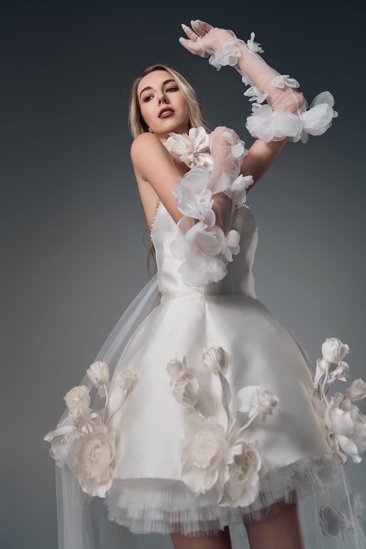 Fiorella 3D floral mini wedding dress with tulle train, side view
