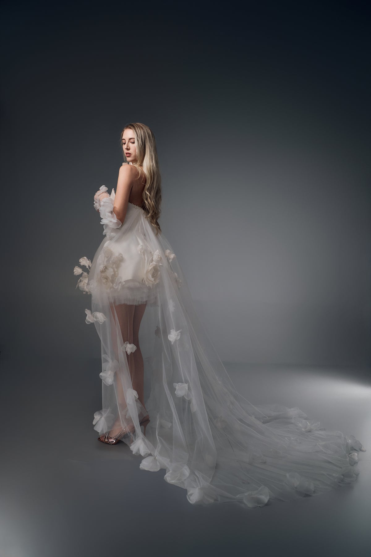 Fiorella 3D floral mini wedding dress with tulle train, train view