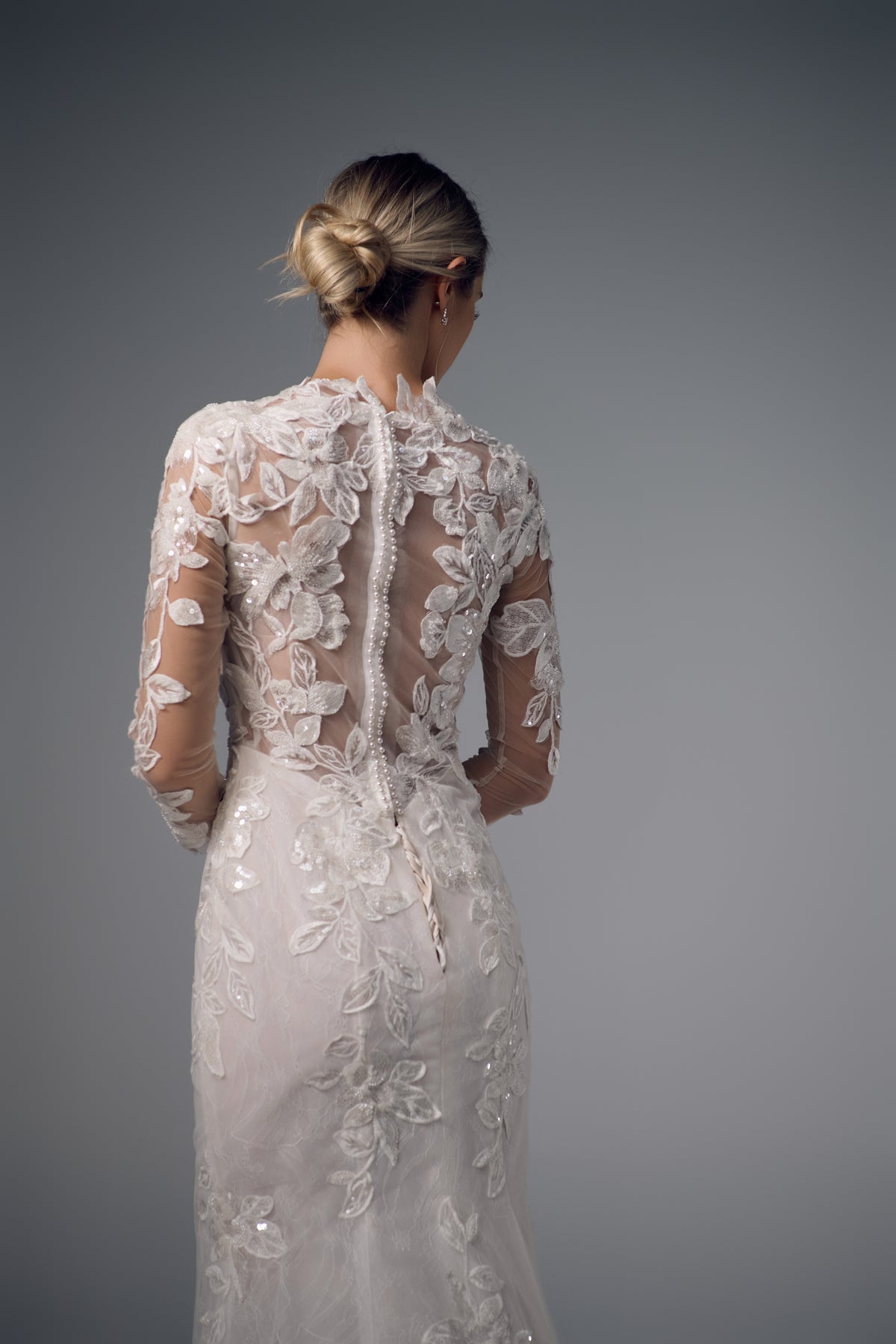 Galatea long-sleeve floral lace mermaid wedding dress, back detail