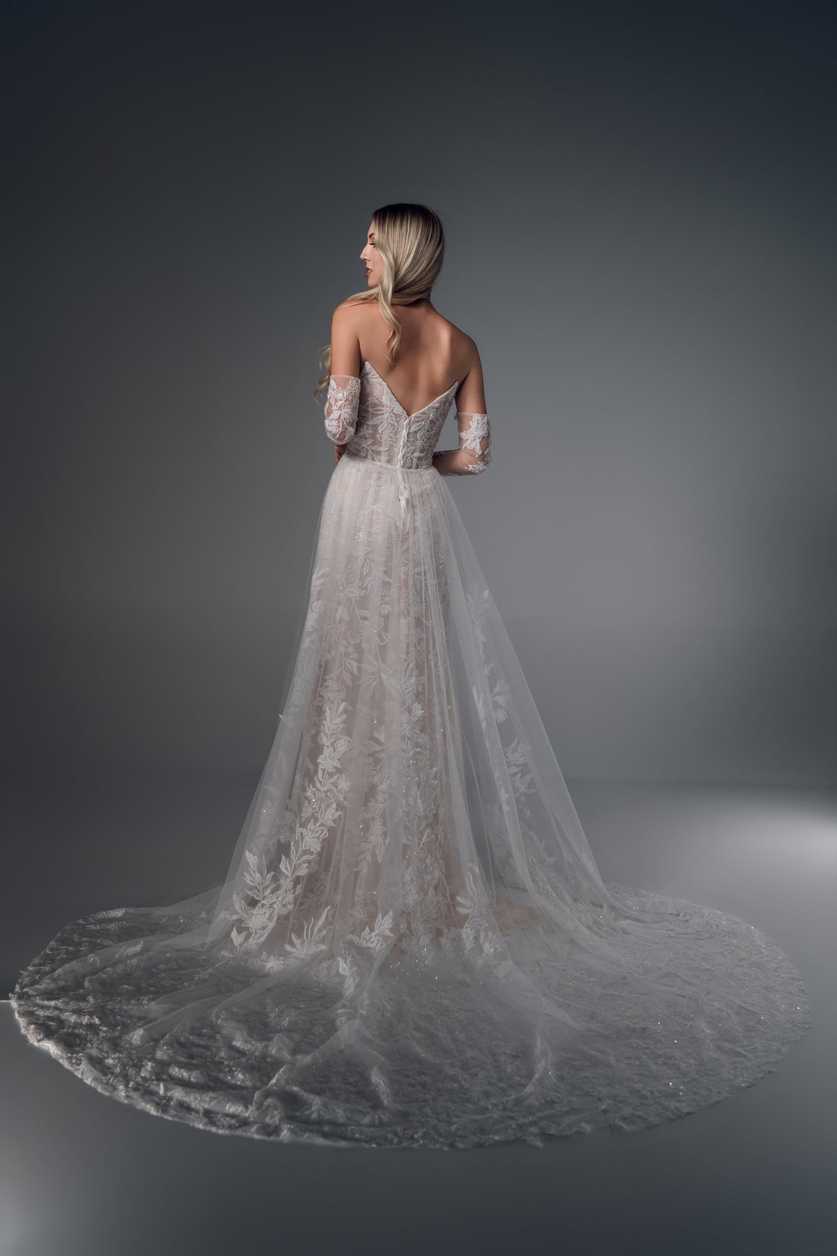 Genevra long-sleeve floral lace mermaid wedding dress, back train view