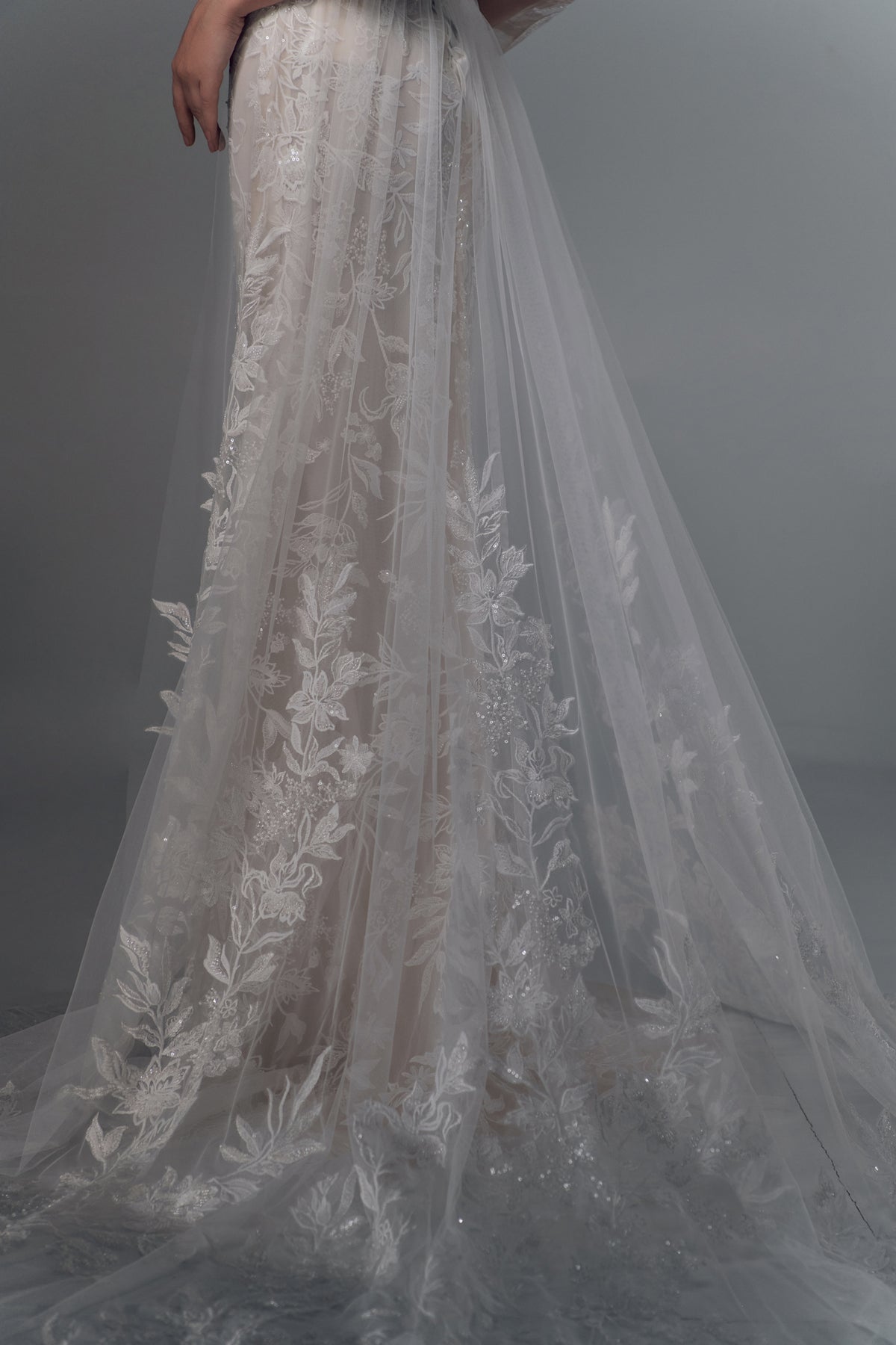 Genevra long-sleeve floral lace mermaid wedding dress, lace detail view