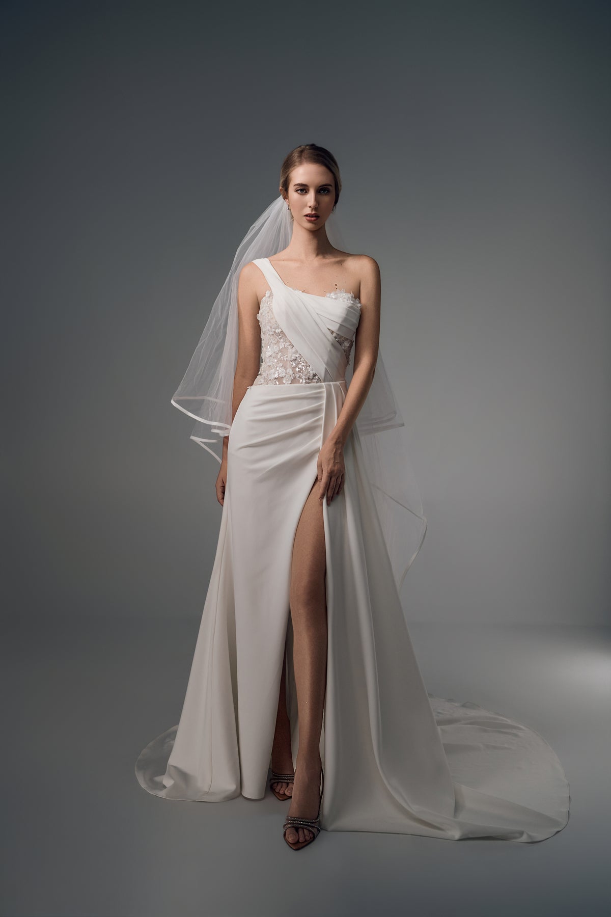 Leontine asymmetric satin wedding dress with lace waist, full-length front view