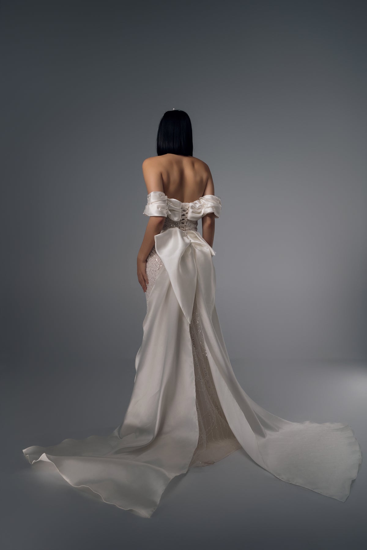 Naevia off-shoulder beaded mermaid wedding dress, back train view