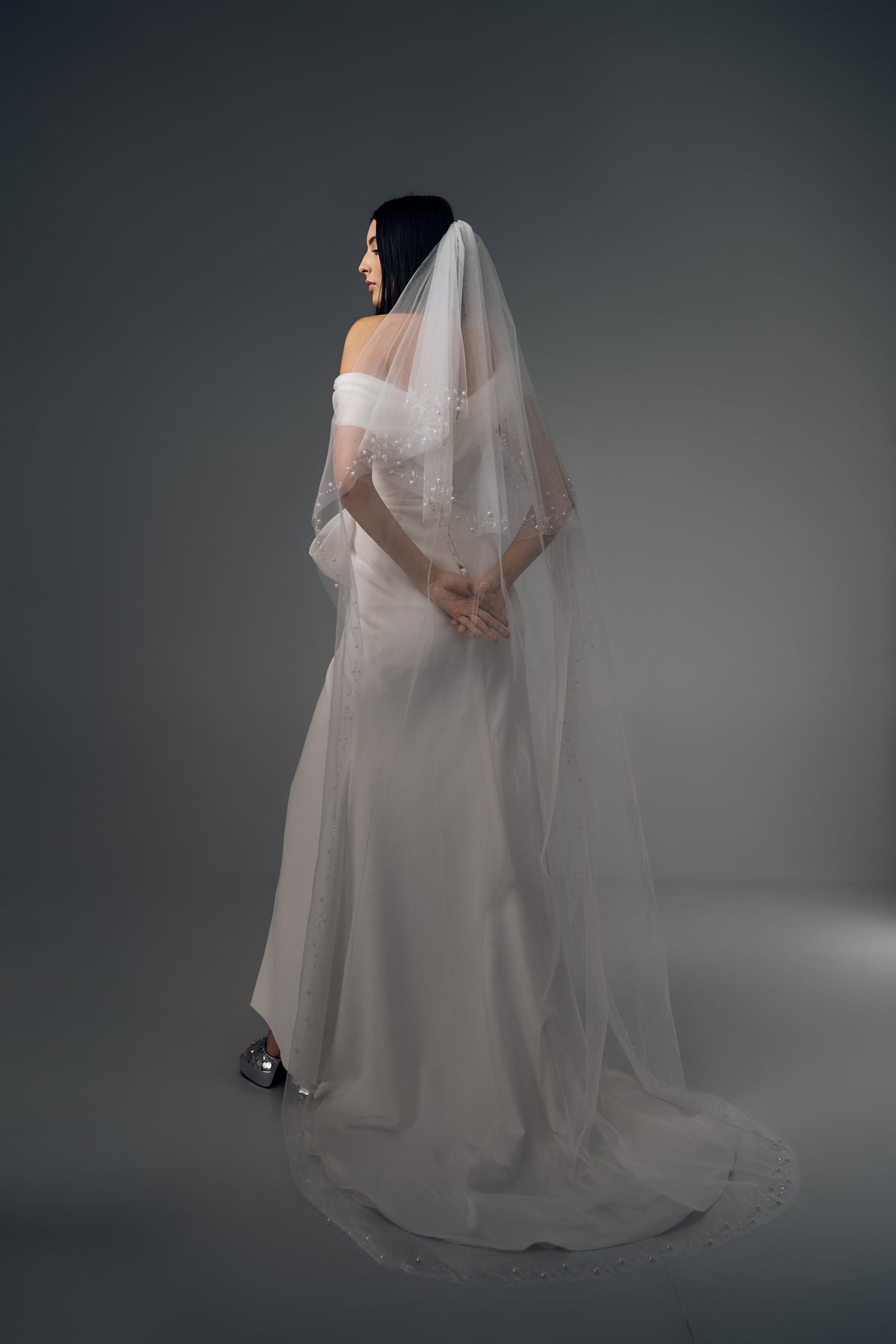 Reverie asymmetric draped wedding dress, veil styling view