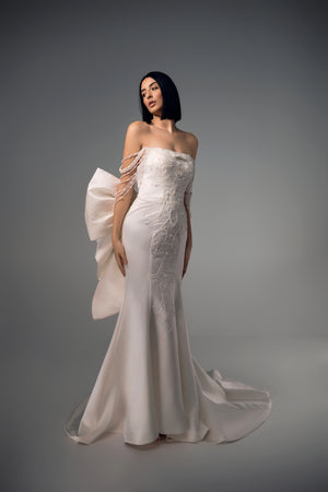 Sidonie beaded column wedding dress with draped pearl strands, front view