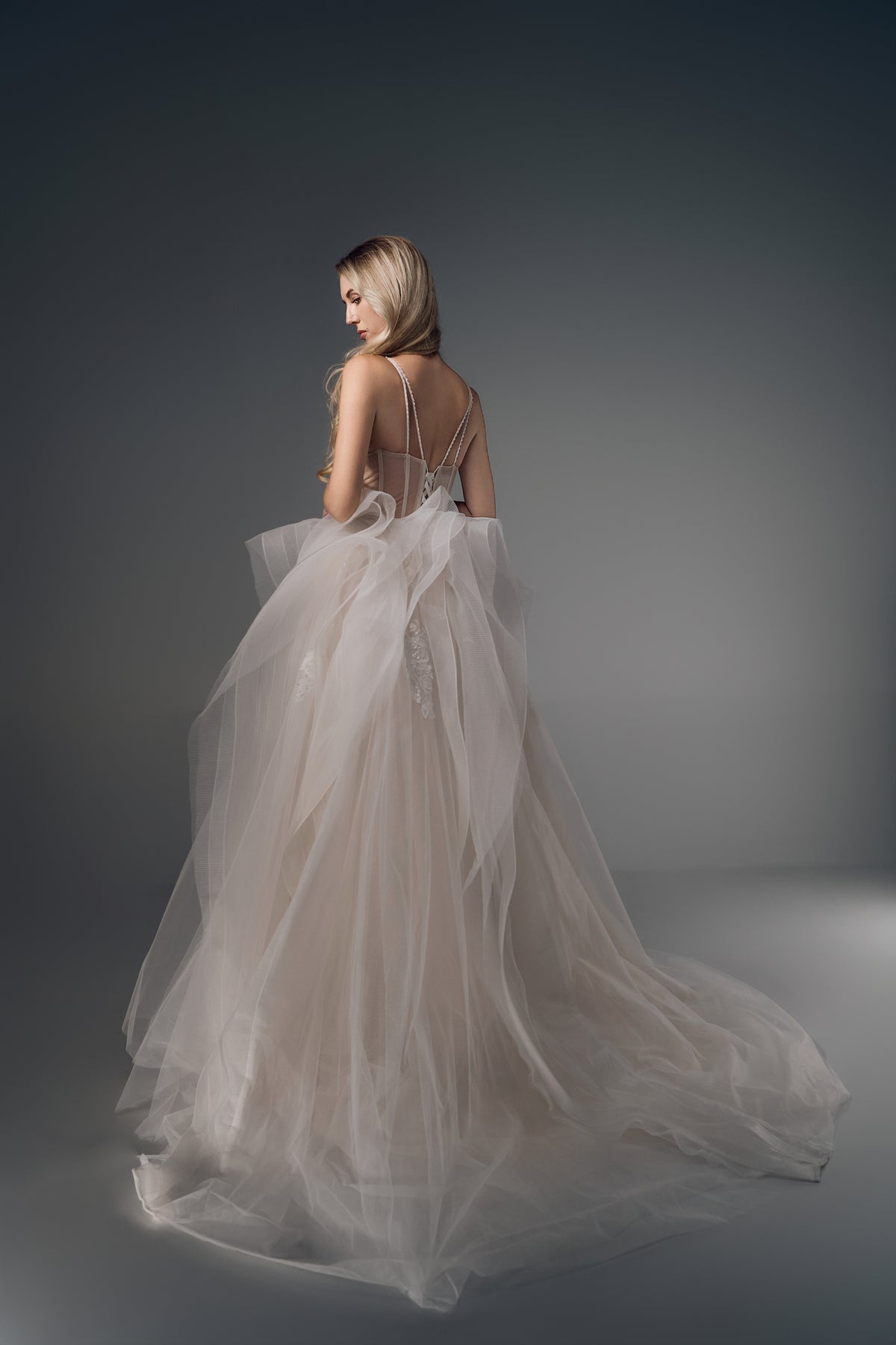 Valencia deep-V ruffled tulle A-line wedding dress, back view
