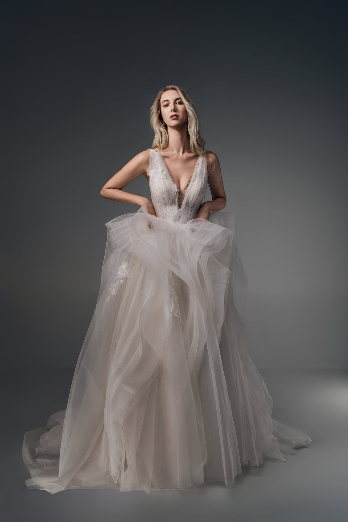 Valencia deep-V ruffled tulle A-line wedding dress, front view