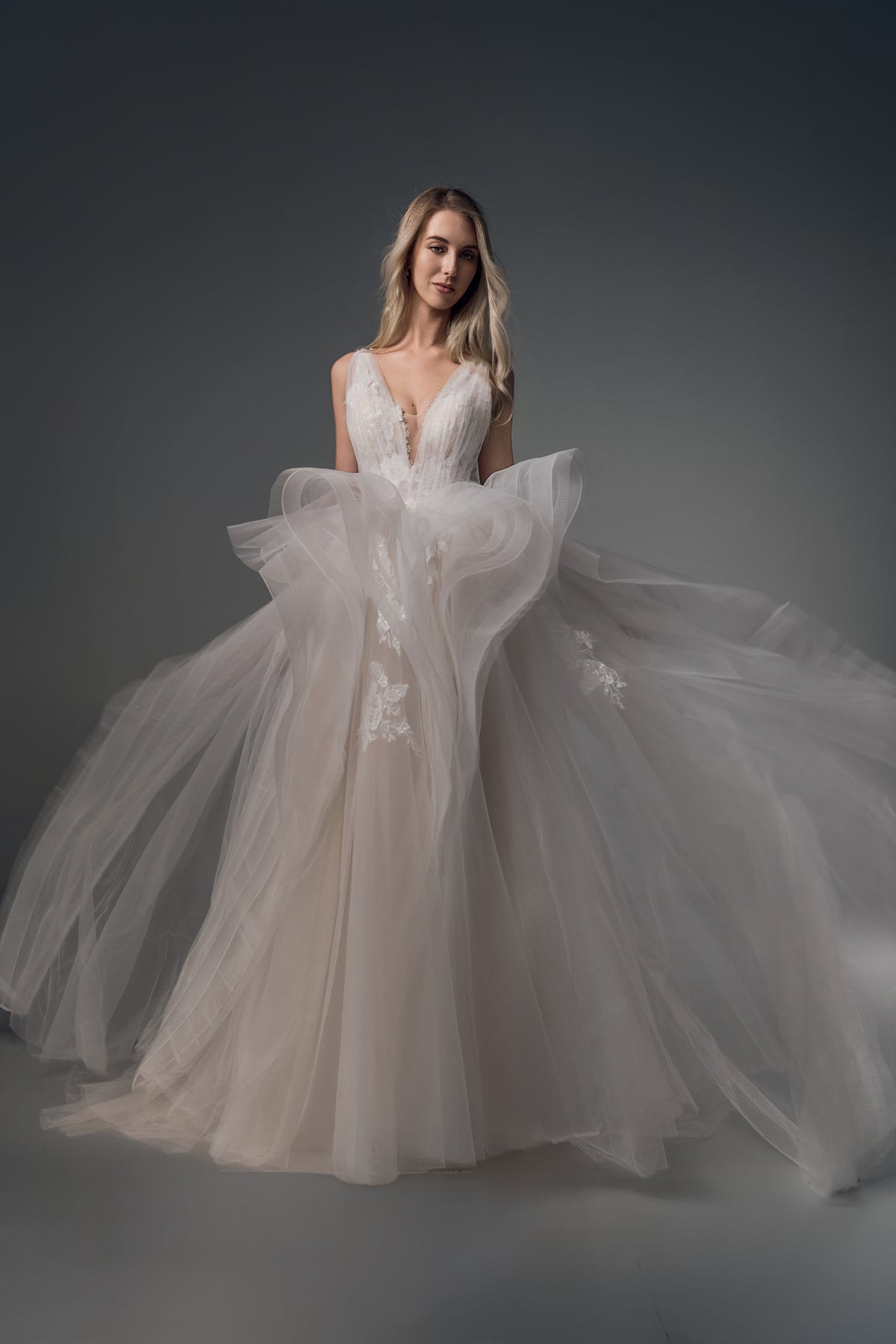 Valencia deep-V ruffled tulle A-line wedding dress, skirt view